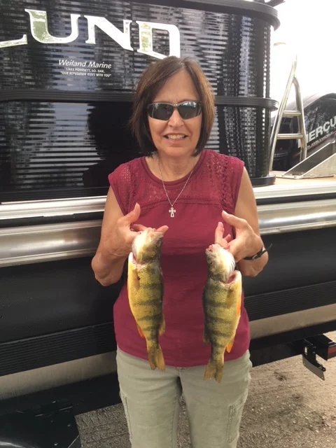 Karen with a 13 1/2 and a 12 1/1 inch perch.
