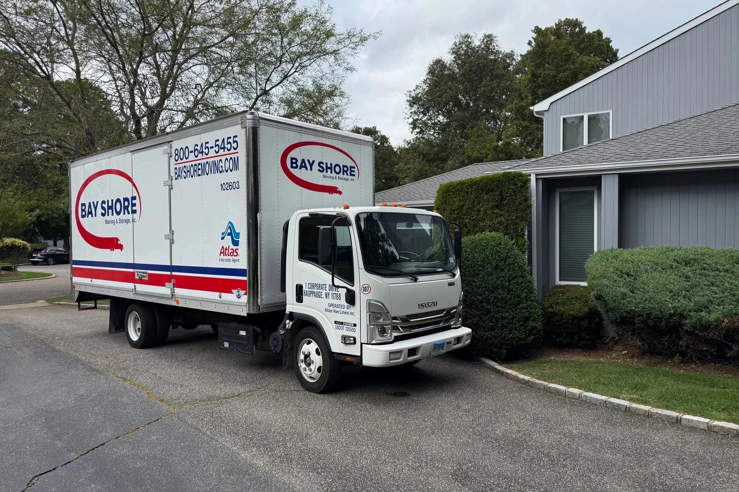 Moving Truck in front of House