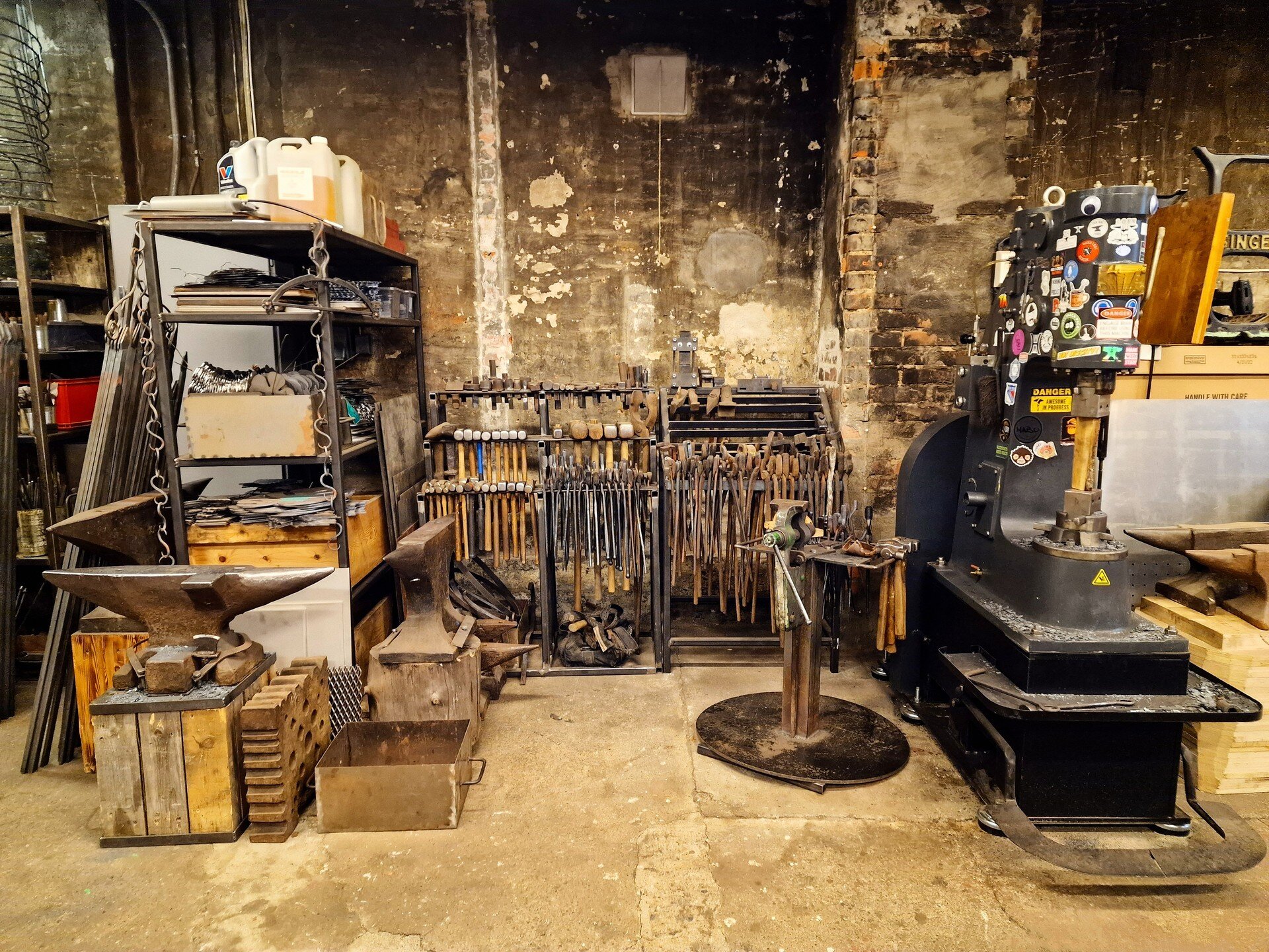 Organisation

I recently reorganised the shop a little bit, especially the hot work area. I still need to find a way to organise my anvils better, but I feel like floor to ceiling shelves probably isn't the way to go with 60+ kg pieces of steel with 