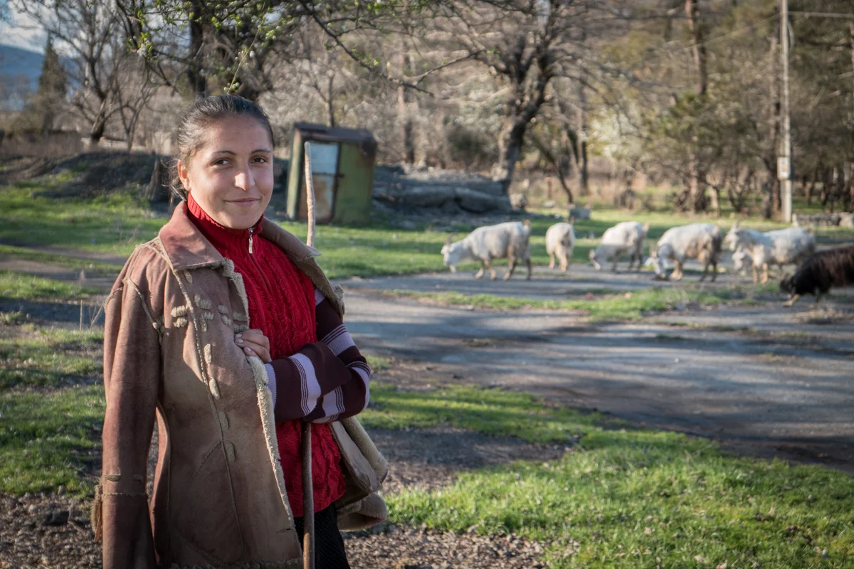 A local goat farmer practises her english with me. 