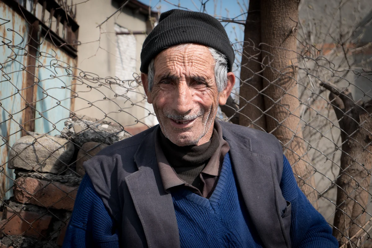 Village smiles.