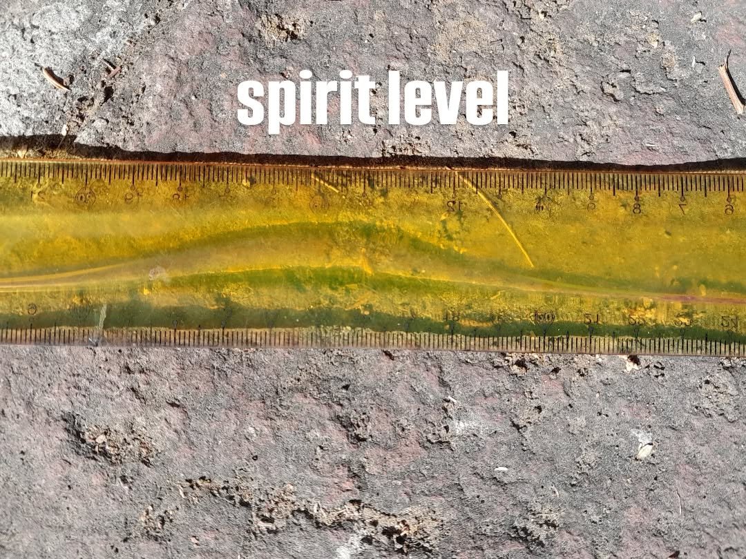 Spirit level - plastic ruler melting in the Mexican sun