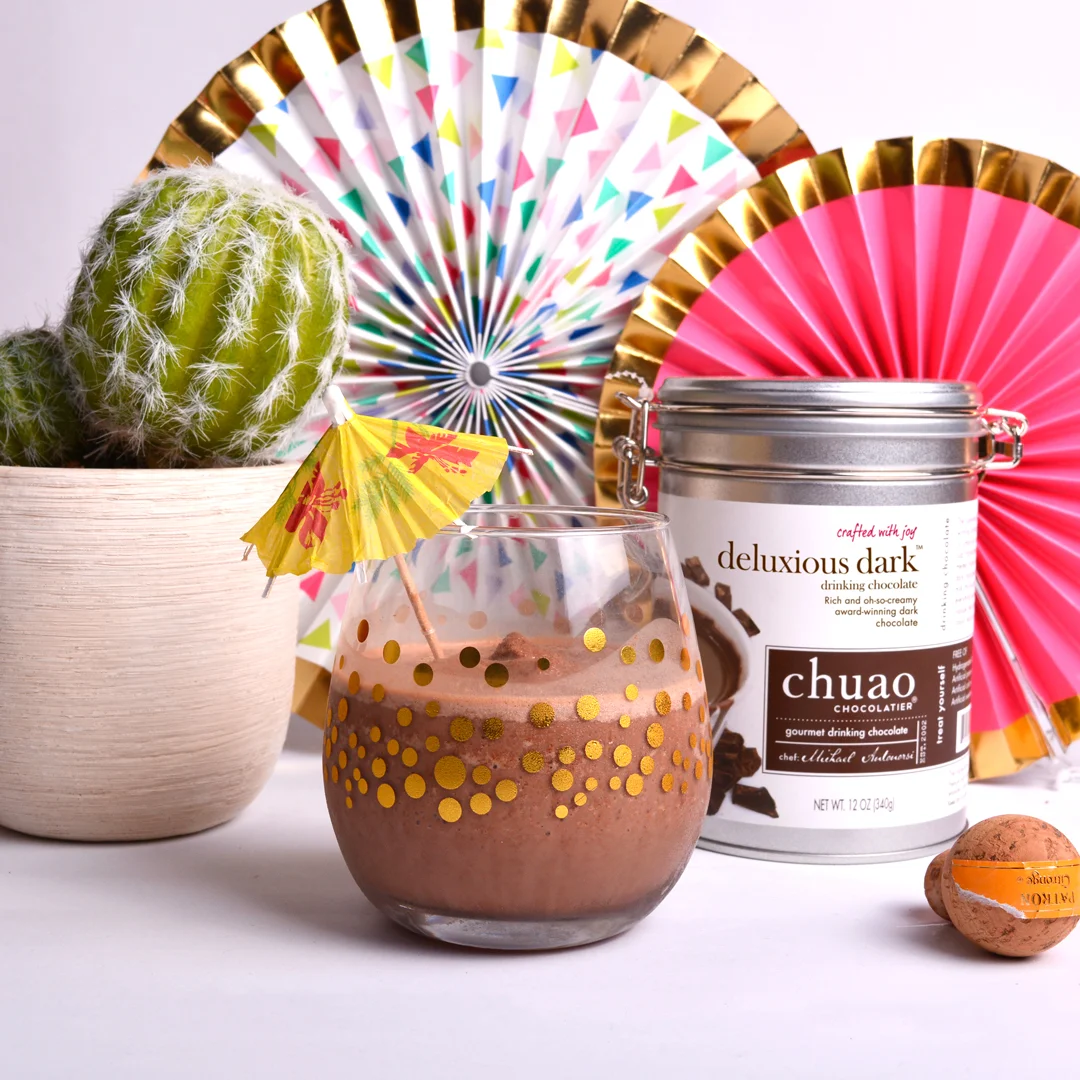 SPRING 2018 - CINNAMON CEREAL SMOOCH Spring image used on social media, signage, and newsletters. showing the chocolate has proven to be rewarding. The diagonal line gives the image some directional guidance and the flowers bring in a soft touch as well as help reinforce the spring vibe.