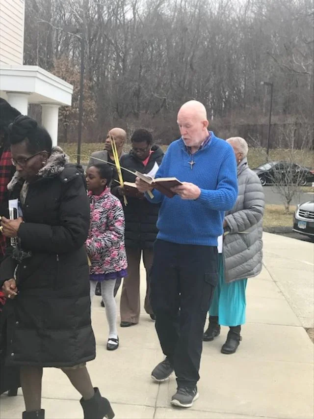 outside procession guy.jpg