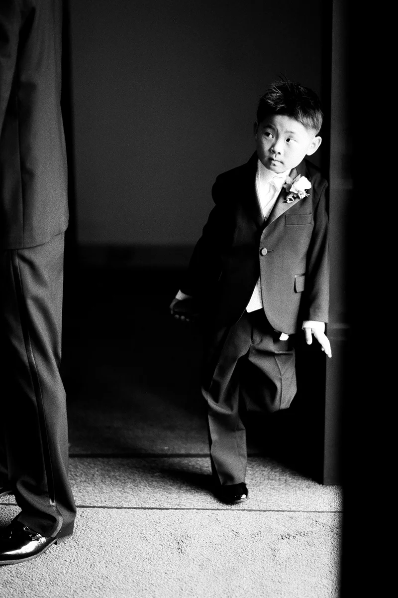 Ring bearer watching the groom at a wedding in Seoul, Korea