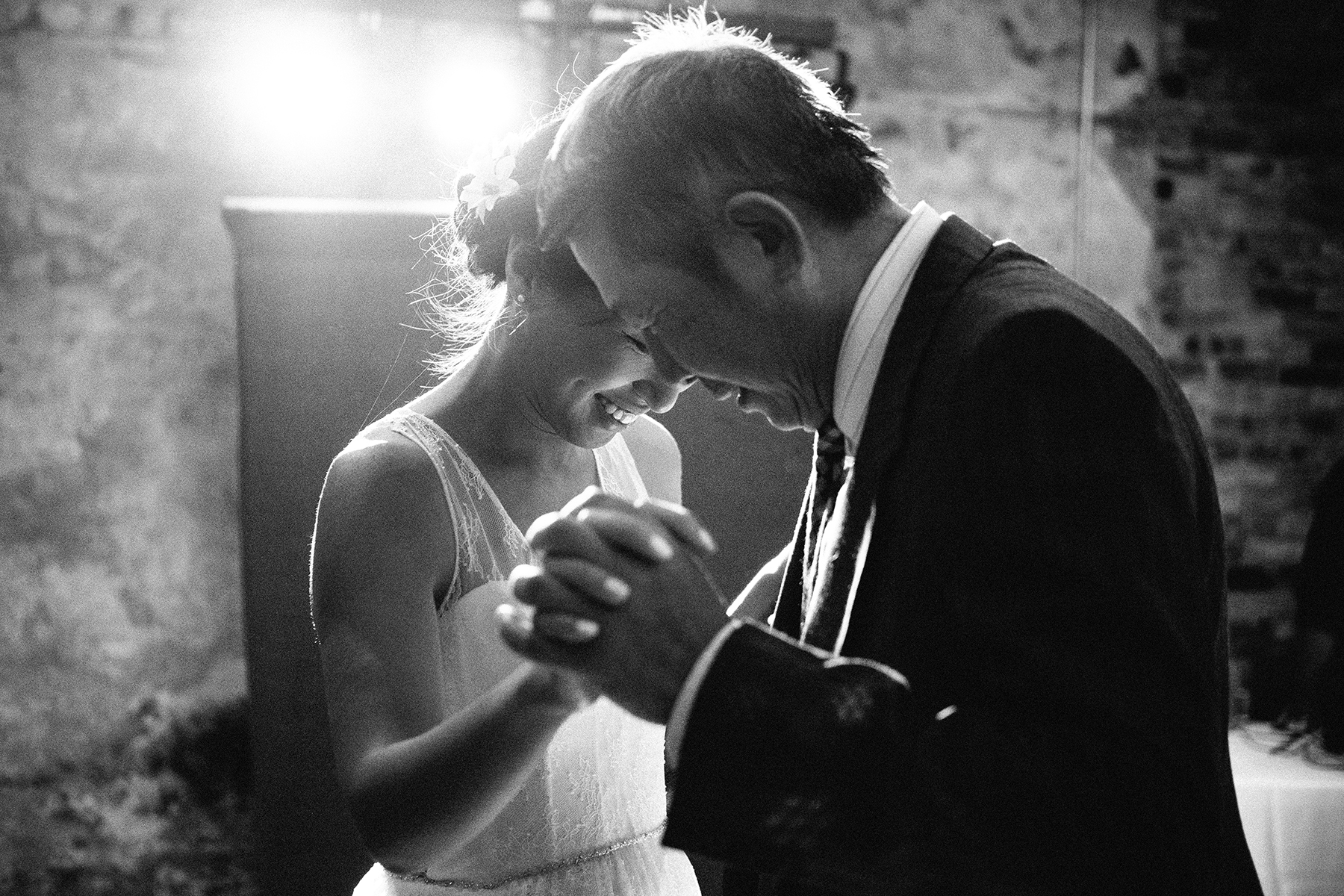 Father of the bride dances with his daughter at The Bachelor Farmer restaurant in Minneapolis