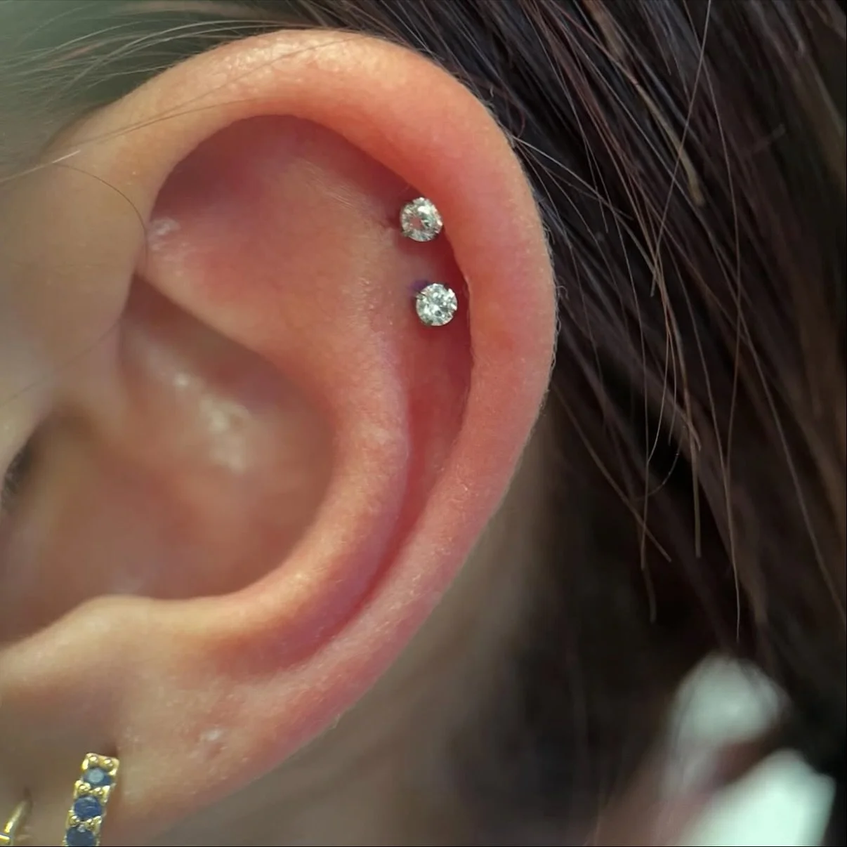 Beautiful double helix piercing performed by our apprentice @aaron_cody_piercing! Give him a follow! He&rsquo;s offering many types of discounted piercings!