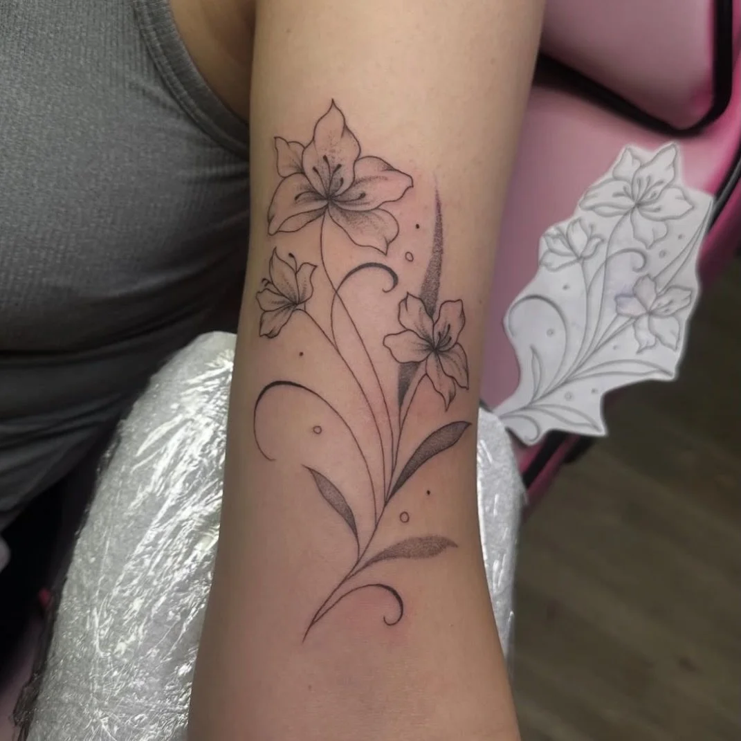 Beautiful fine line floral piece done by Hannah!