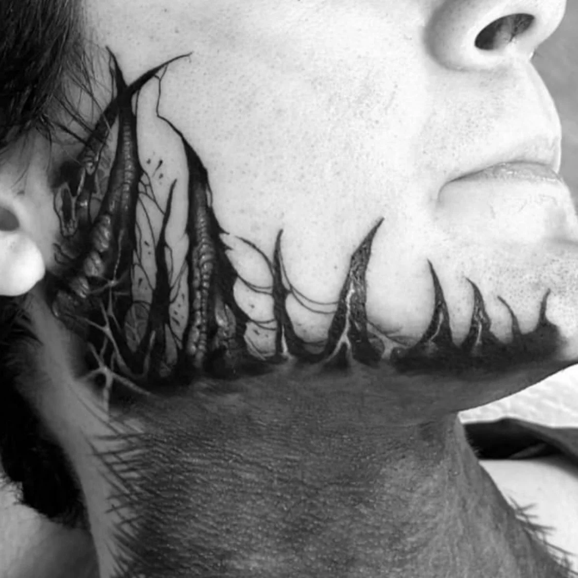 Crazy freehand piece from jawline to hairline done by Clay!