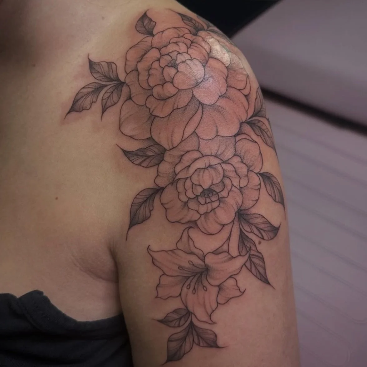 Fine line flowers done by Hannah