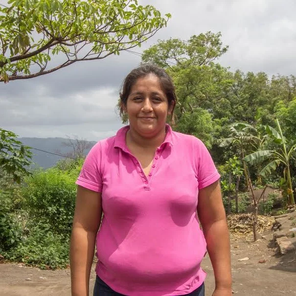 Name: Claudia Jemalario Age: 31 years old Product: Dragon Fruit Family: 2 siblings (1 brother, 1 sister) and 2 children (son, daughter) Location: Los Velasquez, Nicaragua About: Before working with Sol Simple, Claudia was subject to long hours and stressful working conditions. Through Sol Simple, she has been able to improve her quality of life and spend more time with her children. She hopes to continue working with Sol Simple so that someday she can pass down the land to her son and daughter. 
