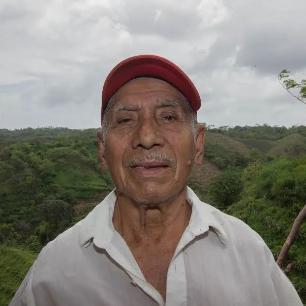 Name: Alejandro de la Cruz Age: 79 Product: Dragon Fruit & Pineapple Family: 7 siblings. 6 children (4 sons, 2 daughters) Location: Los Velasquez, Nicaragua About: Alejandro draws his inspiration from the lessons taught by his parents. He says that from a young age, he worked hard to provide for his family and overcome obstacles. Alejandro is proud of the land he owns and the family he has raised. 