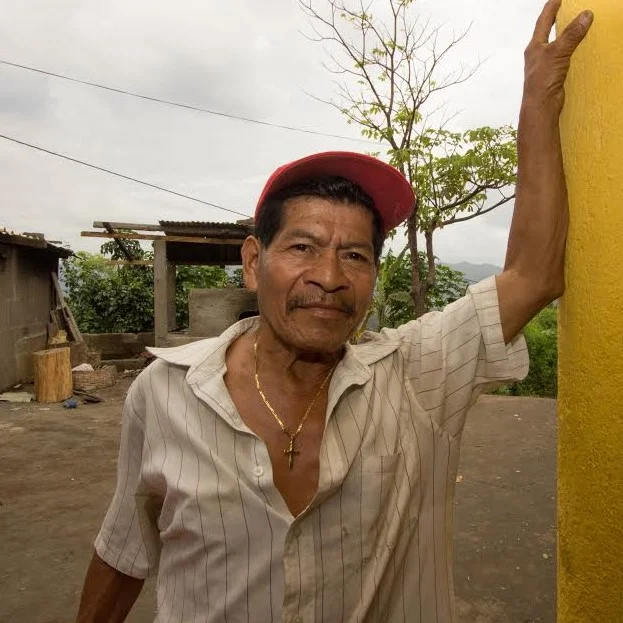 Name: Enrique Lopez Hernandez Age: 60 Product: Dragon Fruit Family: 6 siblings Location: Laguna de Masaya, Nicaragua About: Enrique began his life as a farmer working with rice under the guidance of his father. His transition to fruit didn’t come until later in life after years of growing rice. Enrique aspires to continue saving money so that he may buy better farming equipment to help increase his yearly harvest.