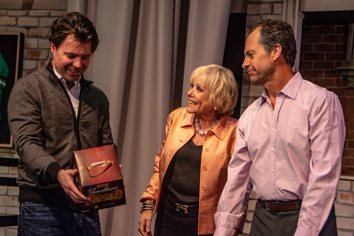 Beau Jackett as “Greg,” Lynda Sturner as “Maxie,” and Tony Travostino as “Peter.”