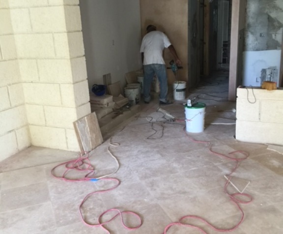Ongoing tiling and smooth plaster finish works