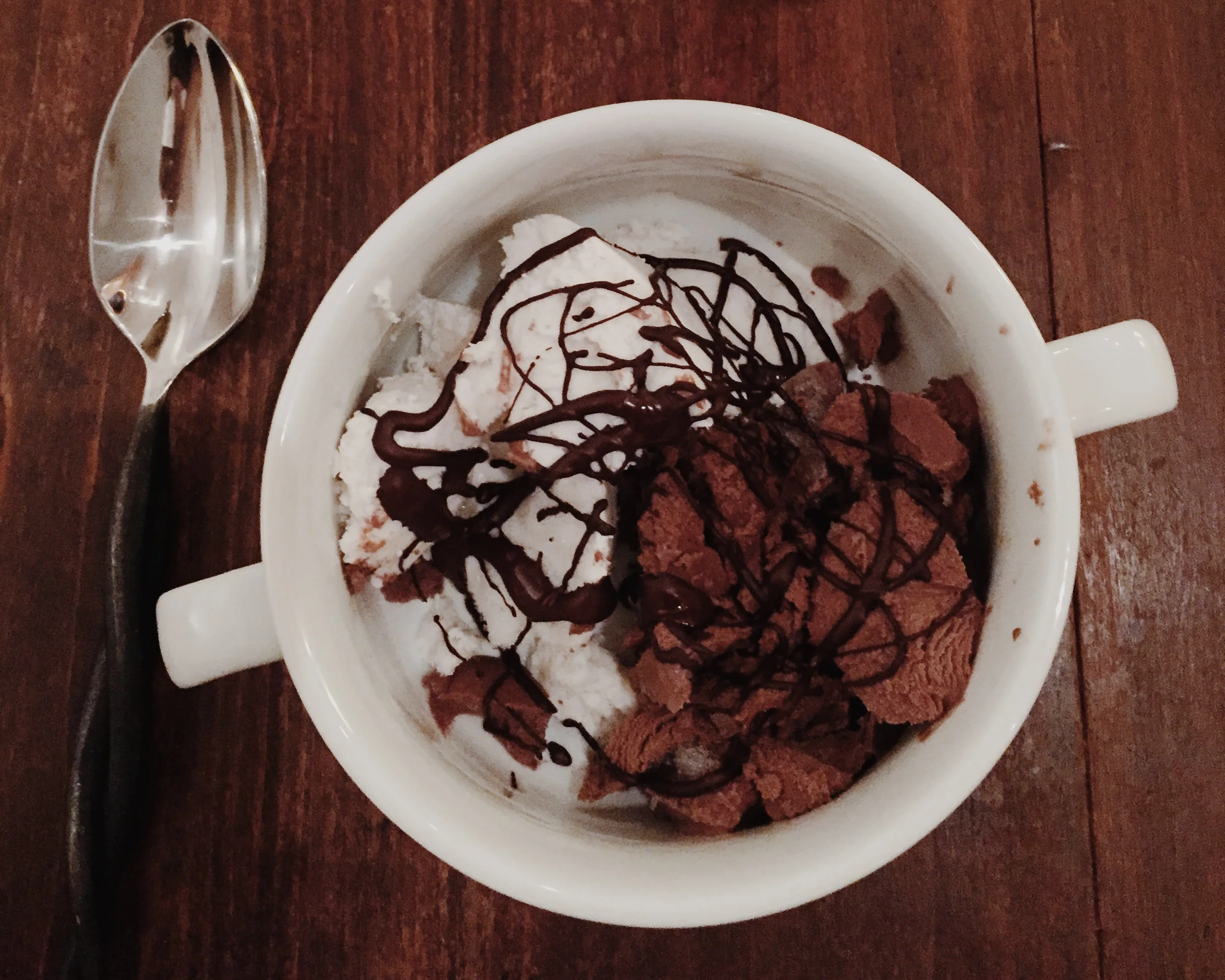 Melted Chocolate Drizzled on Creamy Coconut Ice Cream