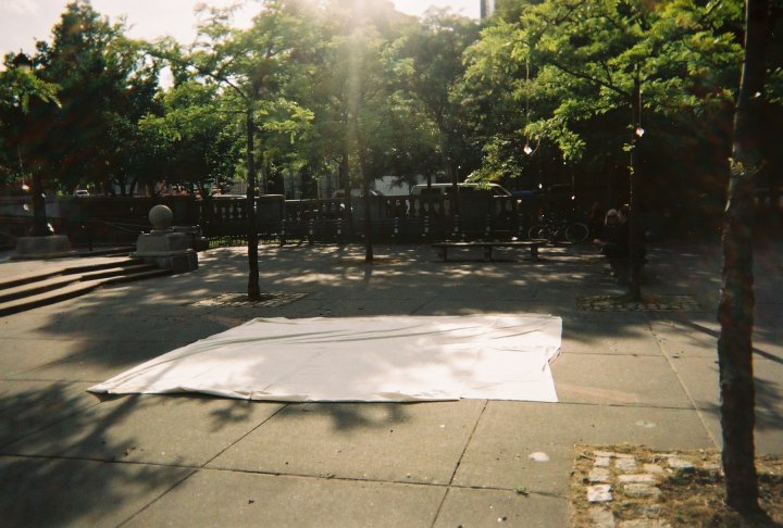 Continental Army Plaza . Brooklyn, New York . May 16, 2010 An interactive happening that took place on the rose compass at the foot of the Williamsburg bridge. Friends and passersby were invited to sit and create a large-scale chalk drawing as an a