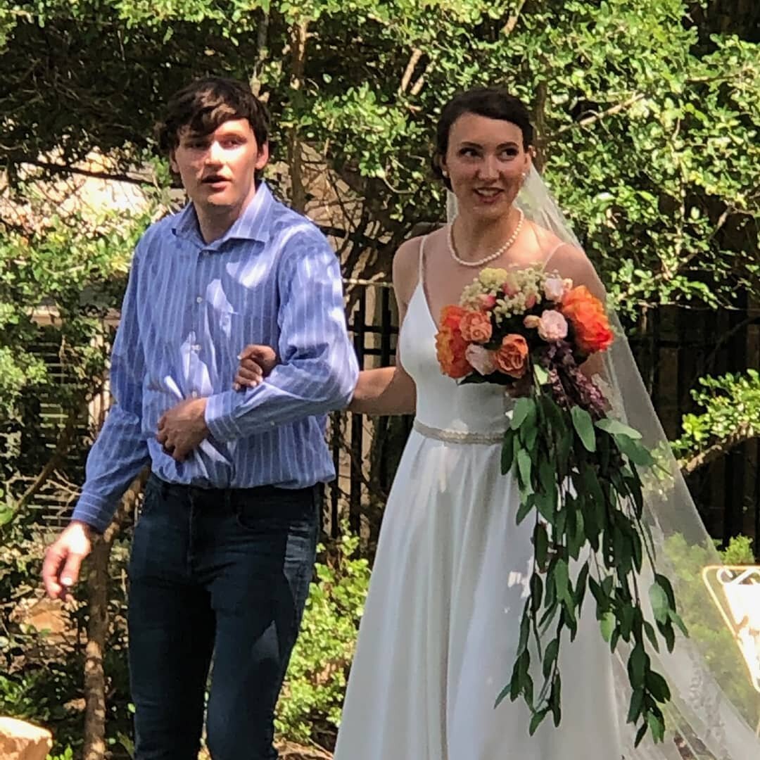 Best behind the scenes photo - Micah getting lost, walking his sister down the aisle...