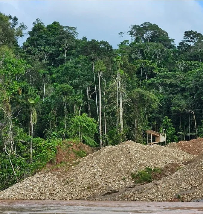 Despite Cofan control of the Bermejo Ecological Reserve, encroachment form miners remains a threat. This photo shows a mining site near the border of the reserve. In the center stands a large sluice box, commonly used to search for gold, surrounded b