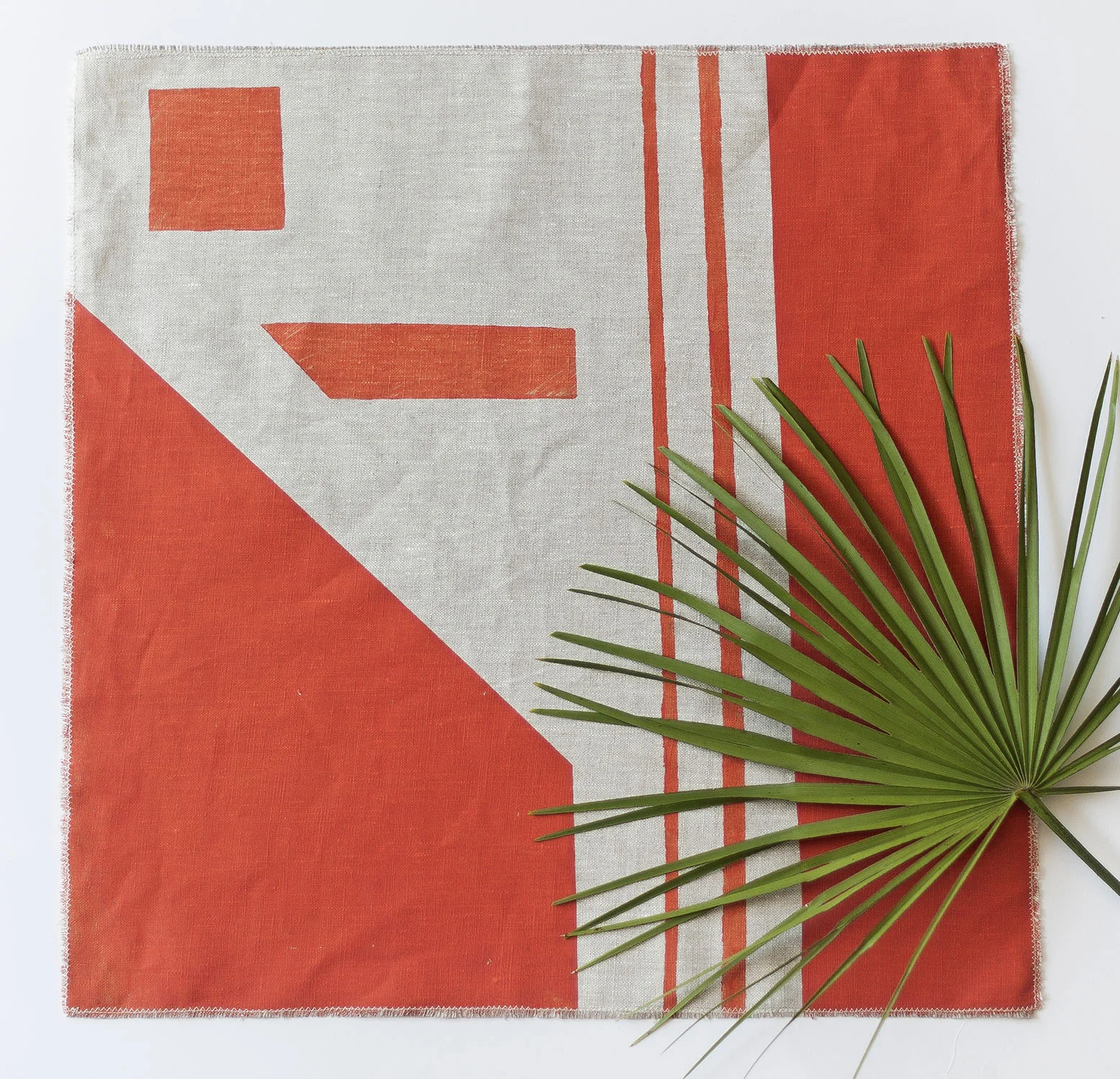 orange napkin with palm.jpg