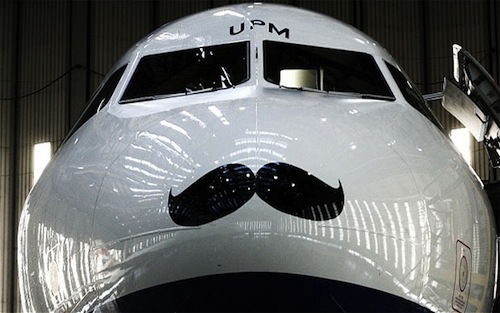 In support of, Movember—an annual campaign to raise awareness of prostate cancer—some airplanes have started sporting mustaches. From a trim upper-lip to a flamboyant handlebar, three airlines—British Airways, Qantas and WestJet—have given their airplanes facial hair makeovers in order to raise money for prostate cancer charities and research institutions. While British Airways is aiming to raise more than £80,000 for the Prostate Cancer Charity, WestJet has launched a contest to reward the Canadian organization with the highest employee participation rate in Movember with two round-trip tickets to any of its destinations. Now that even airplanes are sporting them, a mustache is officially the coolest accessory to own this month.
via: Design Taxi