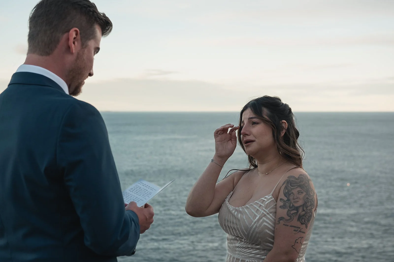 bride wiping tears during acadia elopement