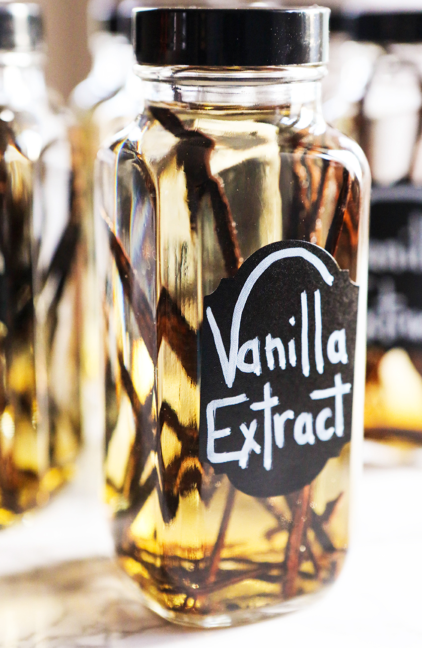 homemade vanilla extract in a jar with vanilla beans inside