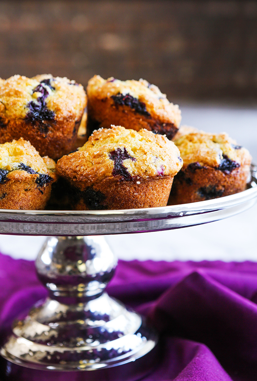 serving platter filled with baked homemade blueberry muffins