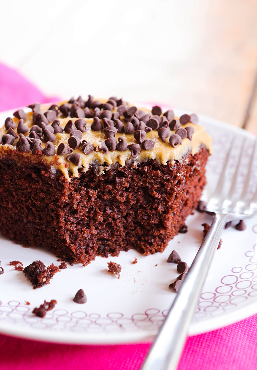 perfectly moist piece of chocolate cake with a bite taken out 