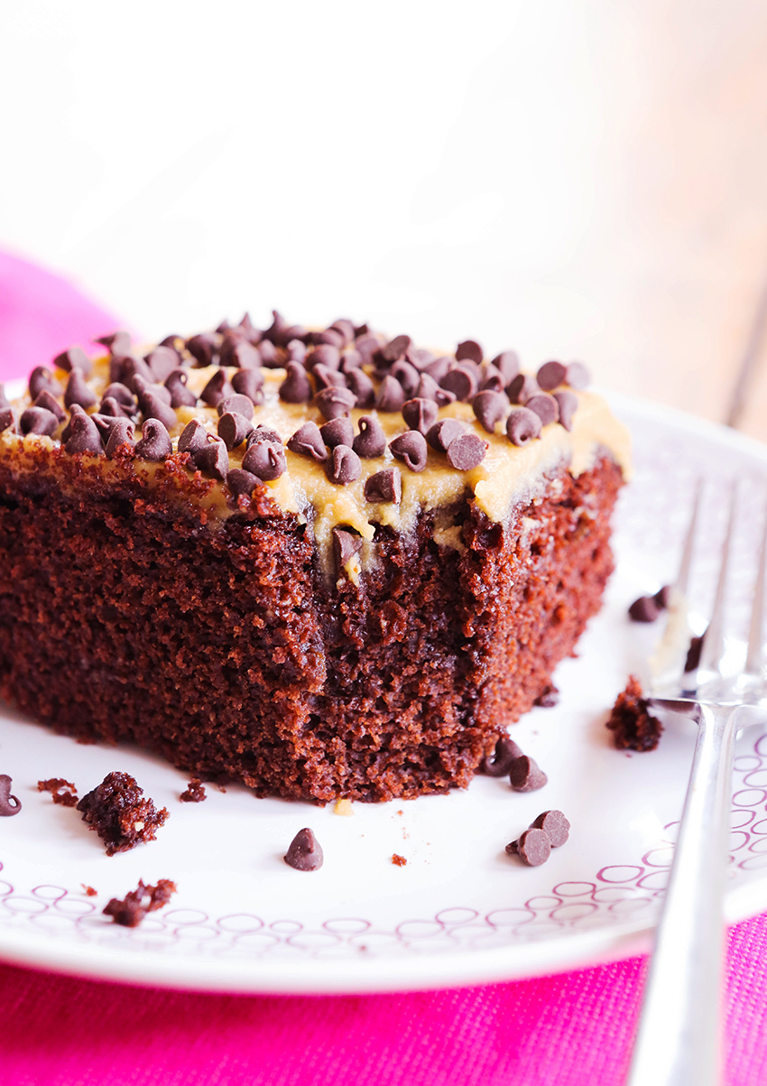 square piece of chocolate cake with a bite taken out of it