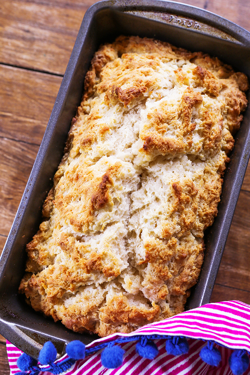 baked loaf of beer bread in the loaf pan