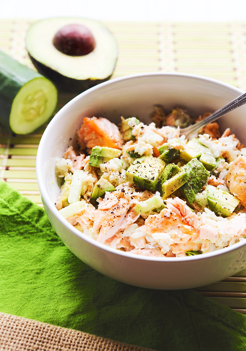 salmon sushi bowl with avocado chunks ready to eat