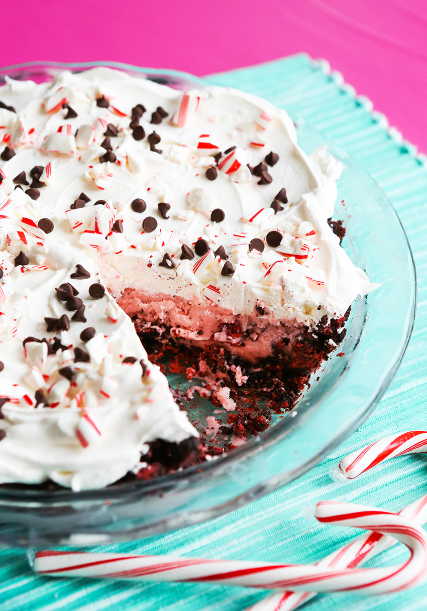 a frozen chick fil a peppermint milkshake pie with a slice taken out