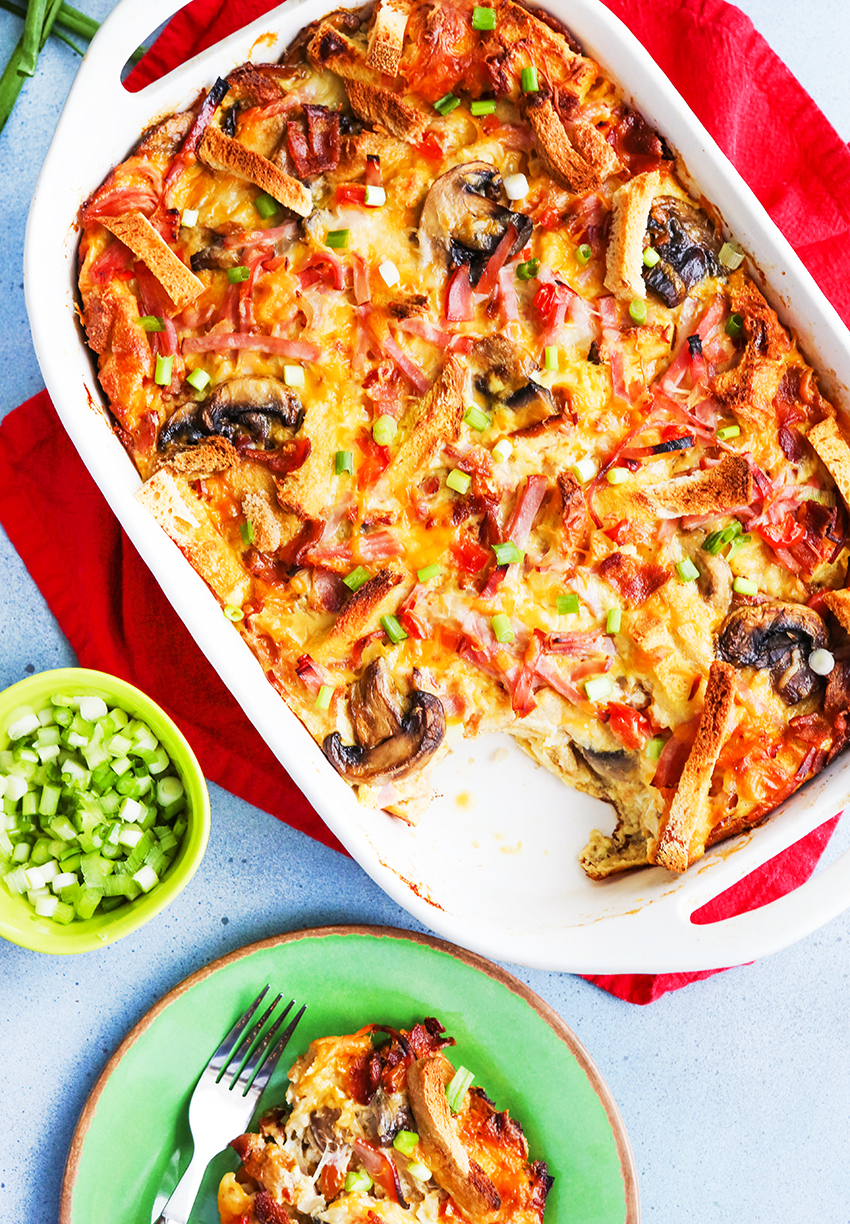 top view of breakfast casserole packed with mushrooms, cheese and breadcrumbs