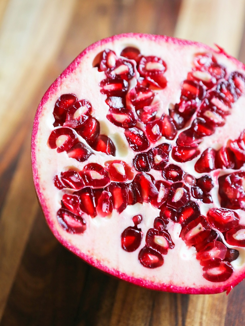 Half of a pomegranate with seeds