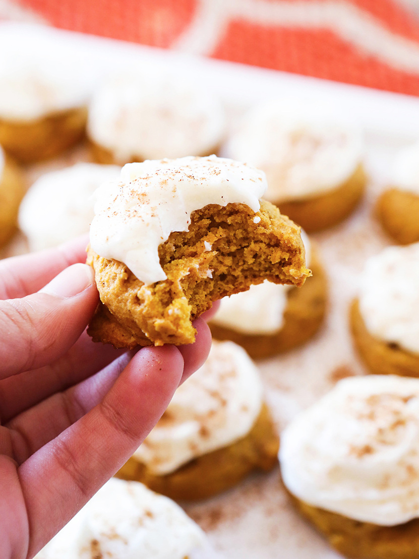  Pumpkin cookies topped with cream cheese frosting 