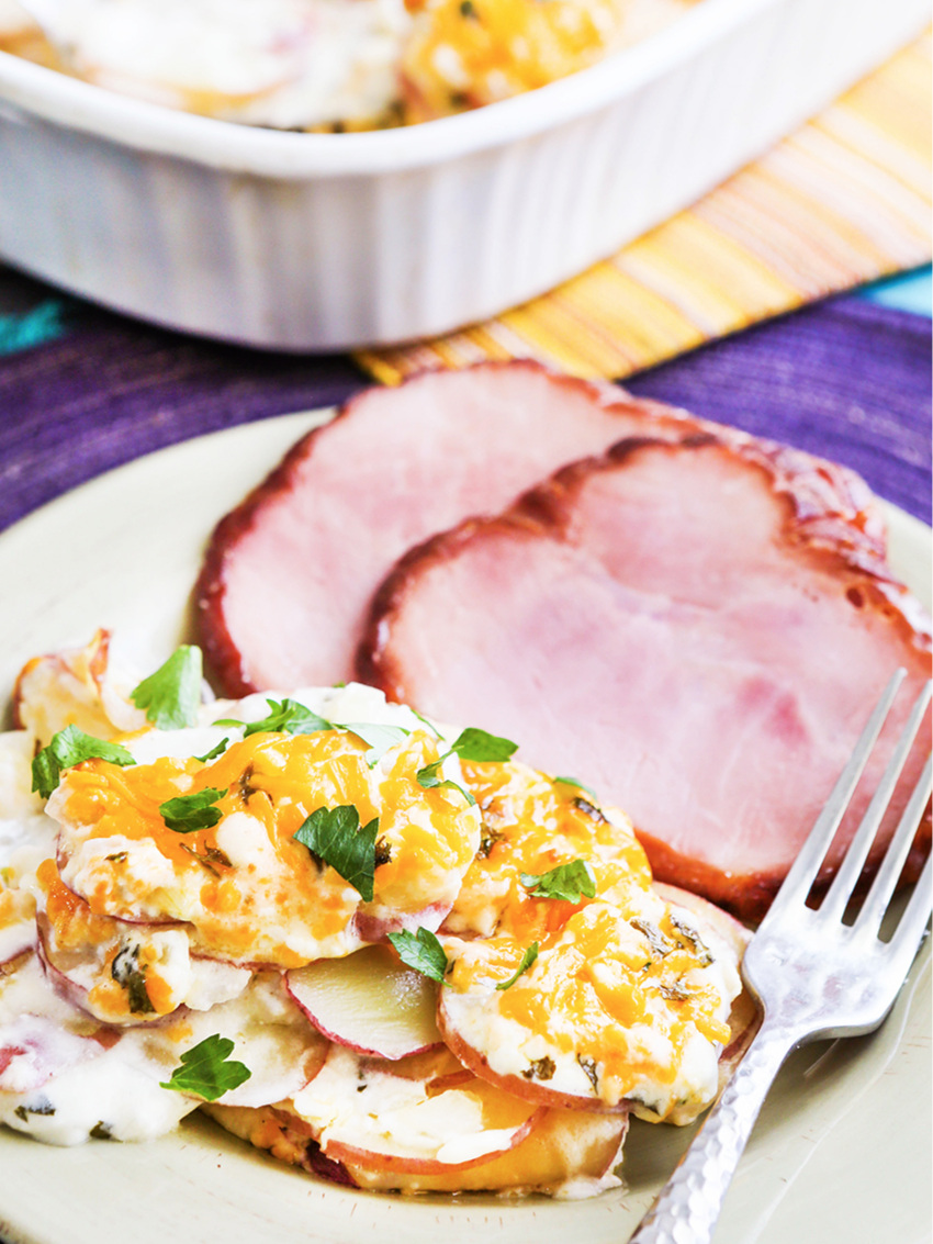 Plate of scalloped potatoes with ham 