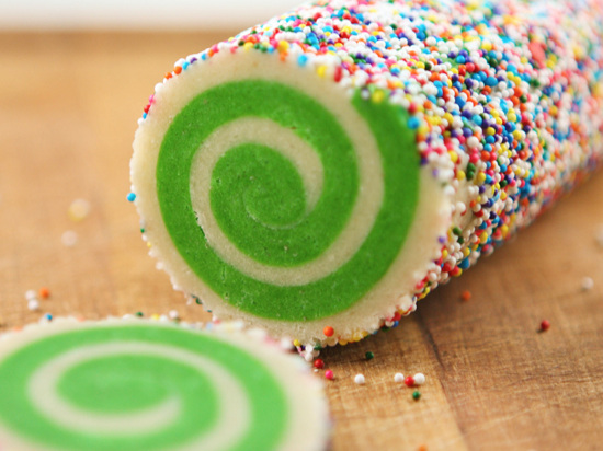 spiral cookies in a log covered in sprinkles