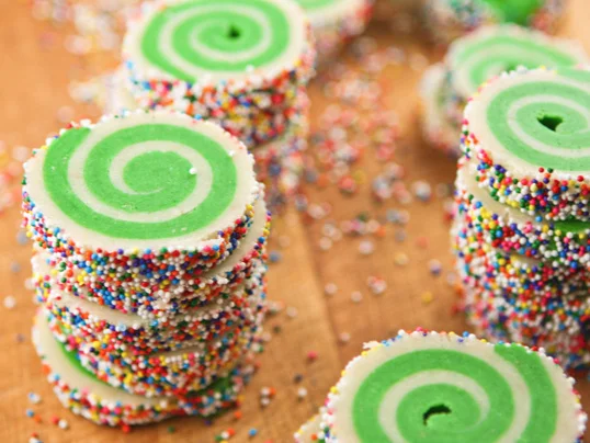 stacks of spiral cookies cut and ready to bake