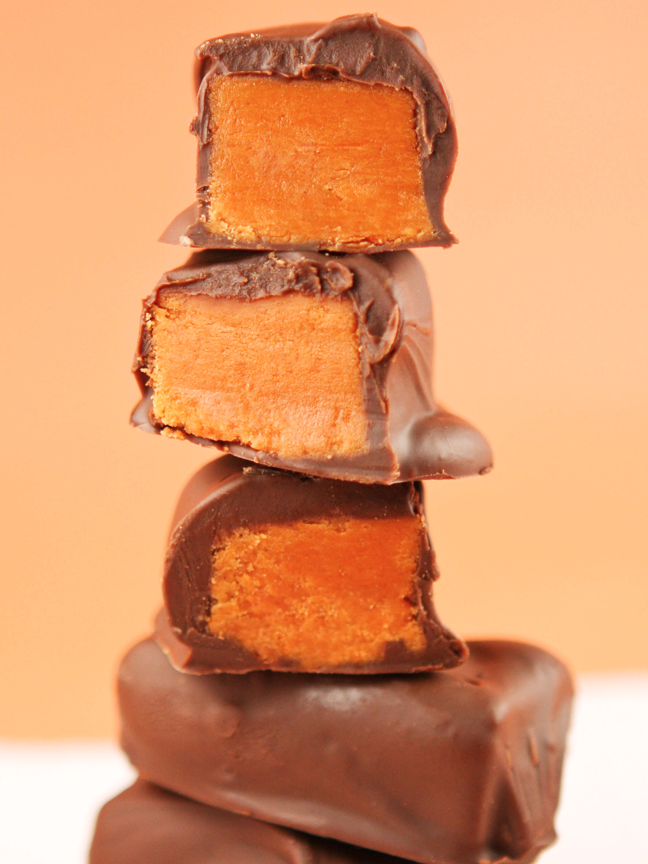 Three butterfinger candy bars cut in half stacked on top of each other