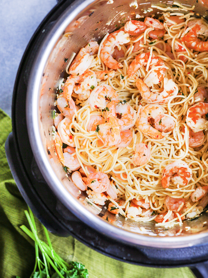 Looking down into Instant Pot filled with shrimp scampi 