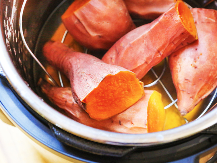 cooked, halved sweet potatoes in an Instant Pot