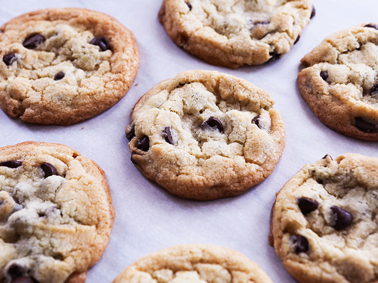 Chocolate chip cookies on parchment paper 