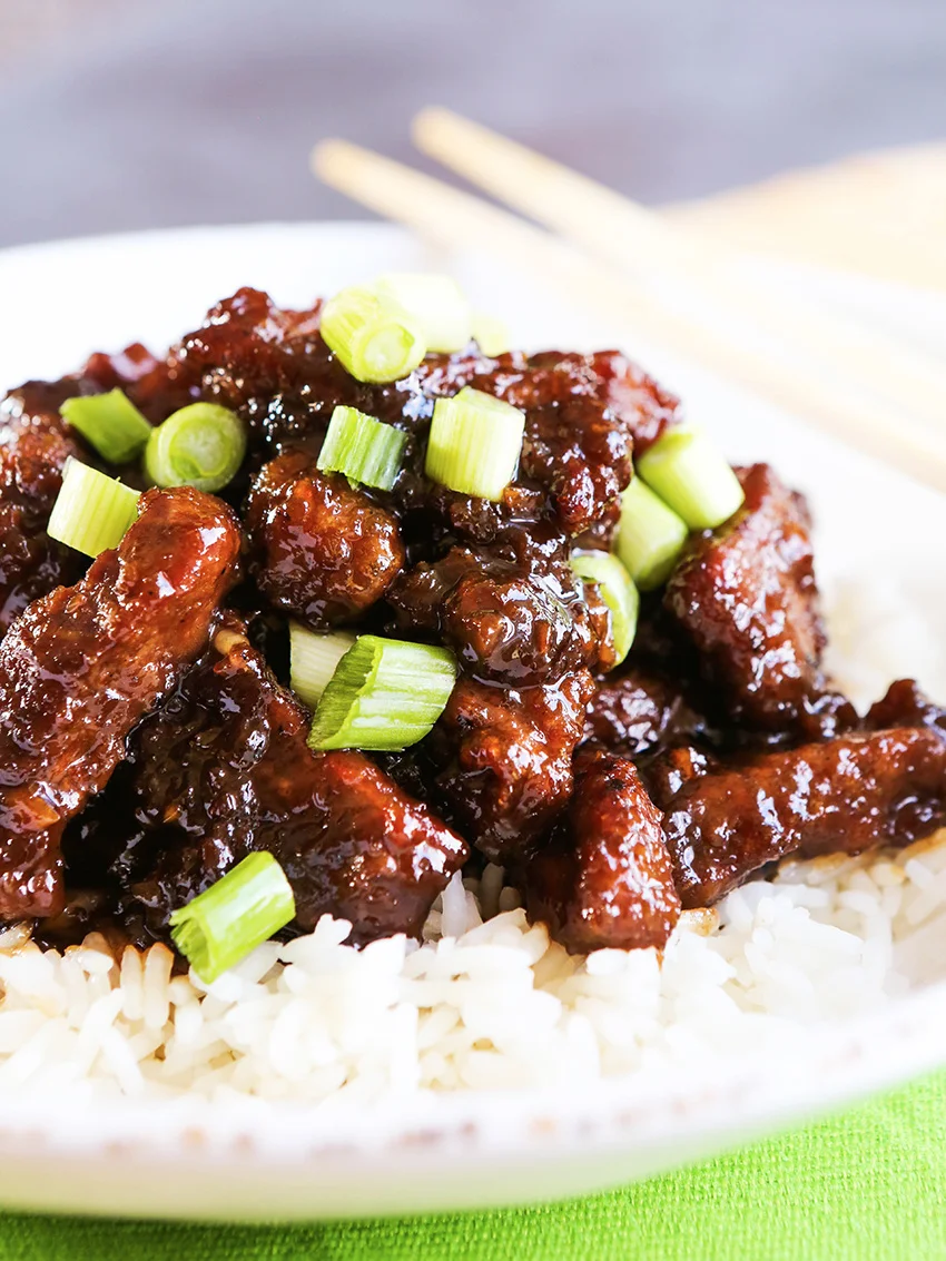  Plate of Mongolian Beef atop a bed of rice 