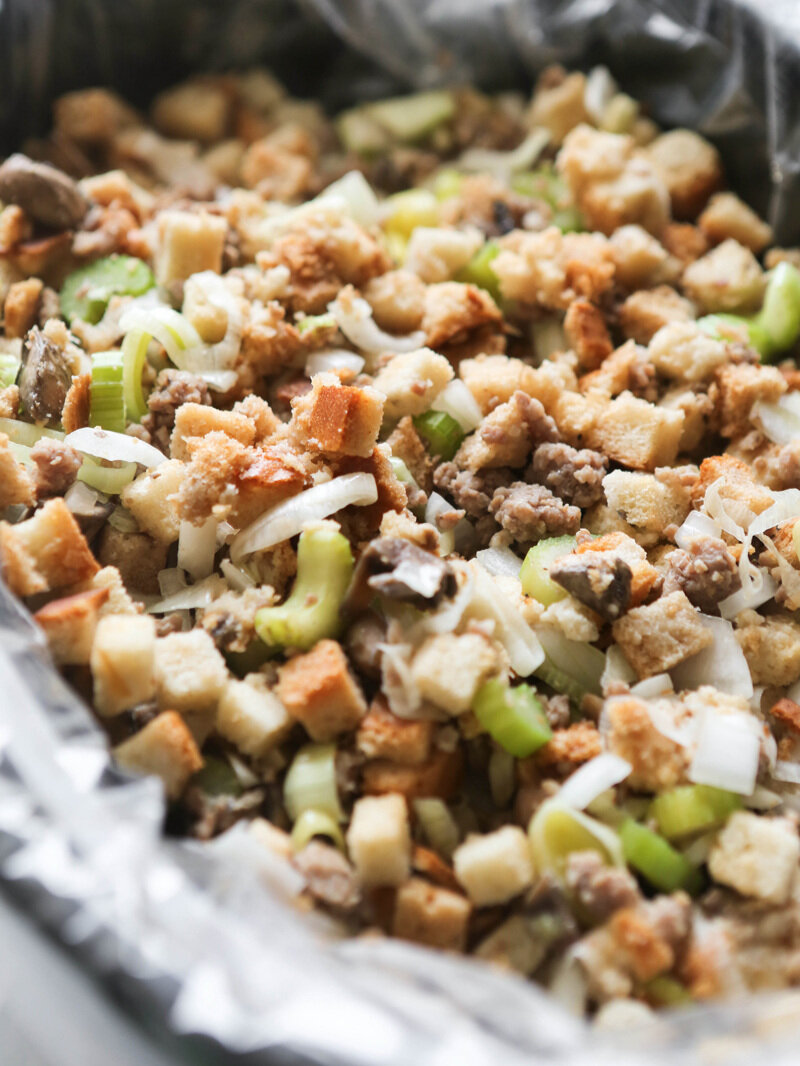  Delicious stuffing piled high in a crockpot liner 