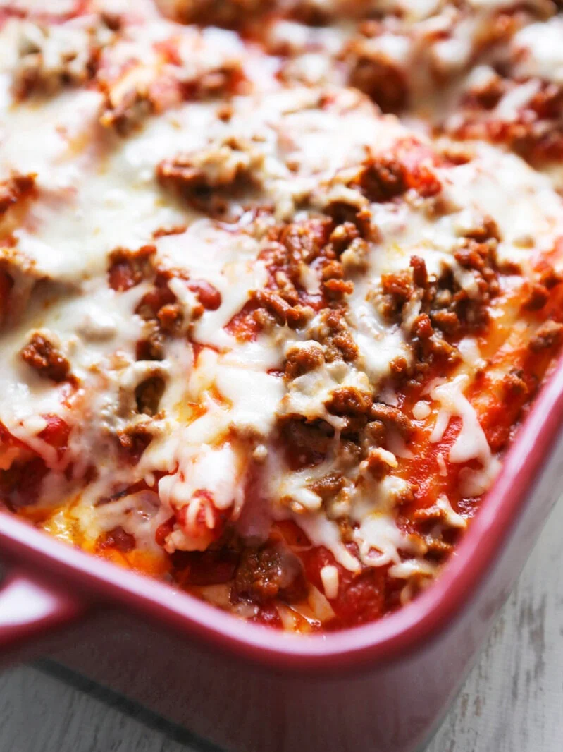 Baked dish of meat and cheese manicotti recipe just out of the oven 