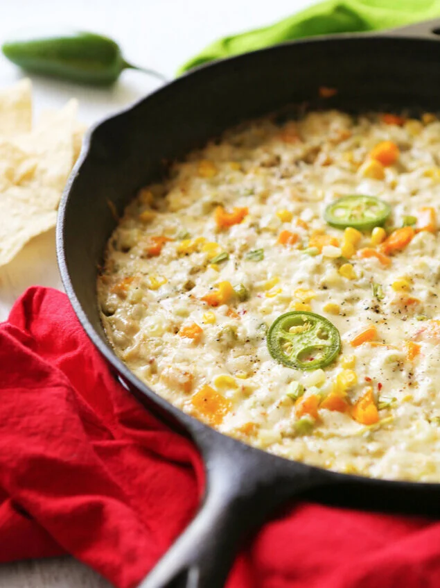 Hot corn and crab dip in skillet ready to serve 