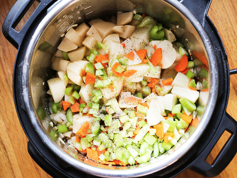Potato soup ingredients in Instant Pot ready to cook 