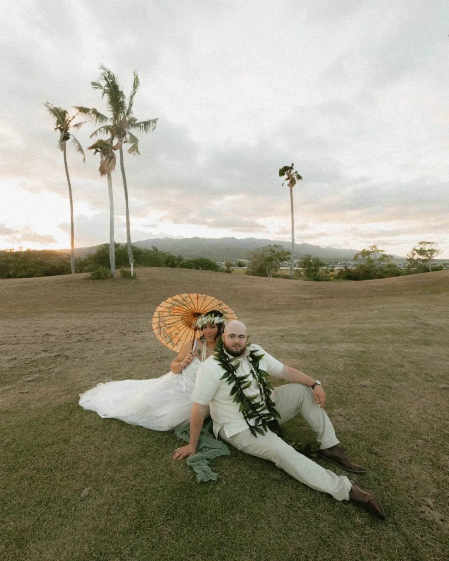 Some love stories are worth crossing the Pacific Ocean for. @elenacording &amp; @gbaby.301 traveled all the way from Maryland to say "I do" in Hawaiʻi, surrounded by the people who matter most. Everything was relaxed and full of laughter. W