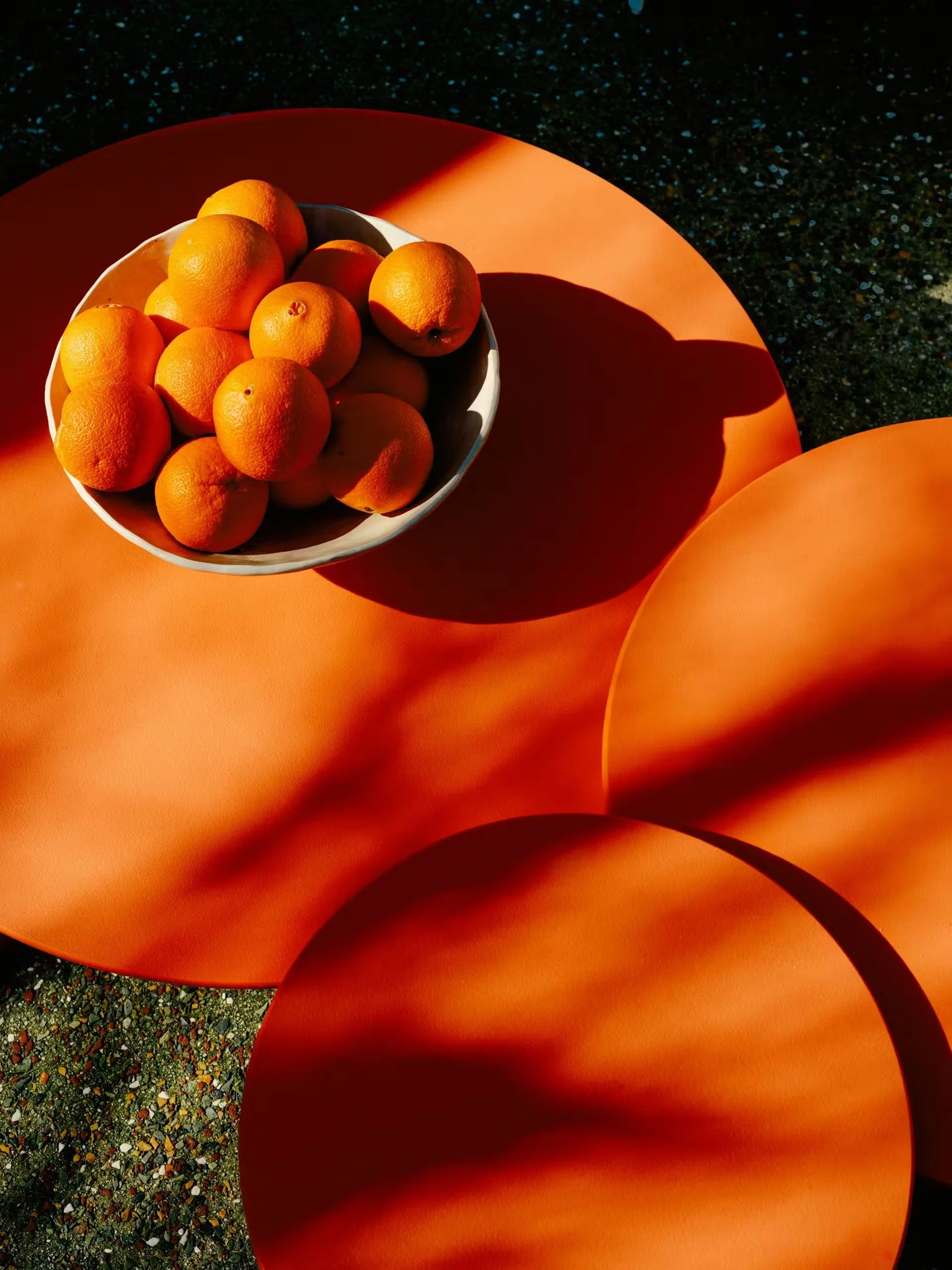 jared frank studio ranchito in dwell daniel dorsa orange tables.jpeg